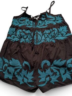 Free People size small Black Spaghetti-Strap Romper with Teal Floral Embroidery